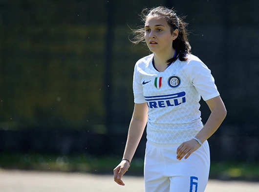 inter girl with white pirelli jersey